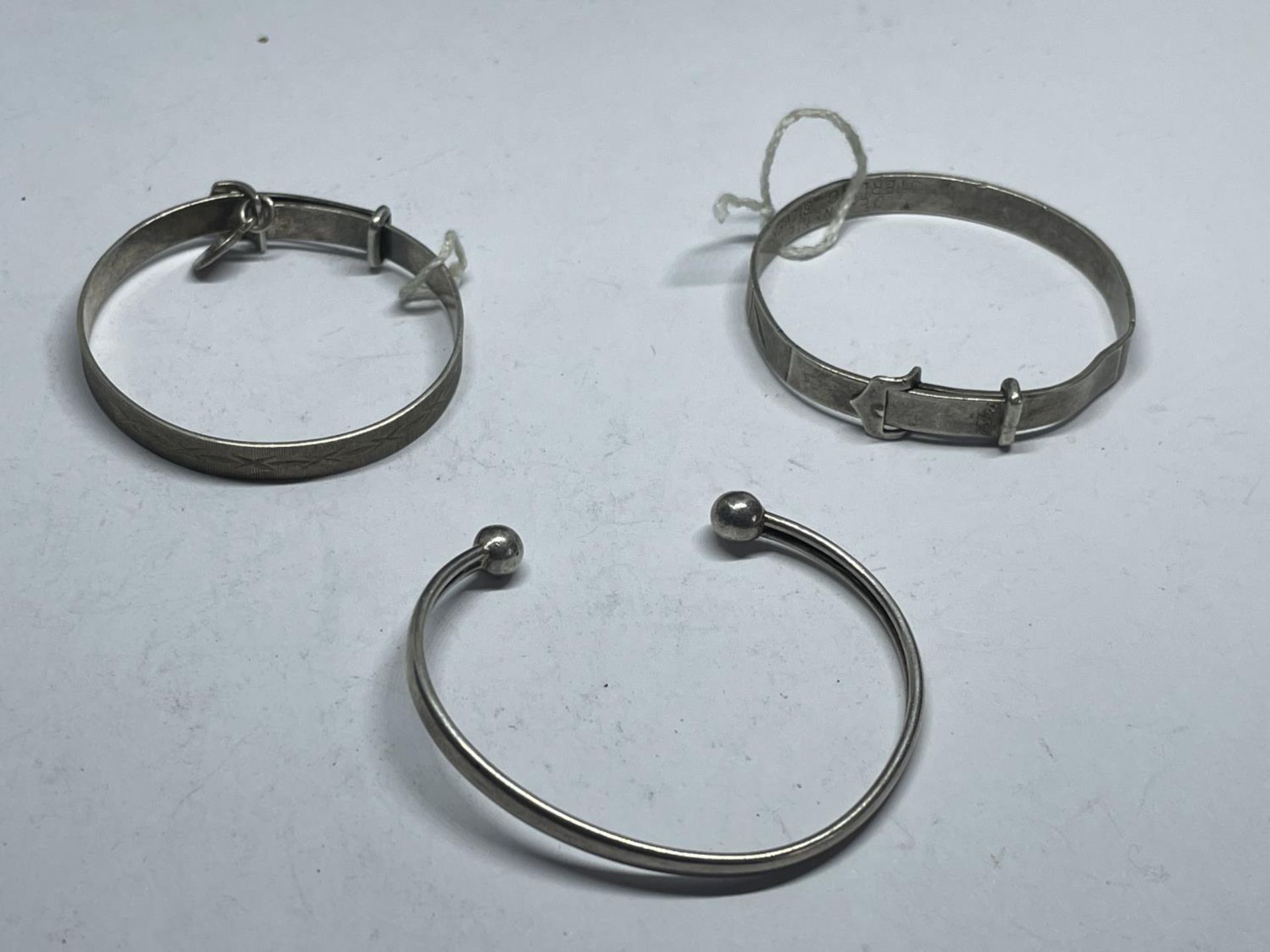 THREE SILVER BABY BANGLES WEIGHT 15.5 GRAMS