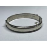 A HALLMARKED BIRMINGHAM SILVER BANGLE WEIGHT 15.8 GRAMS