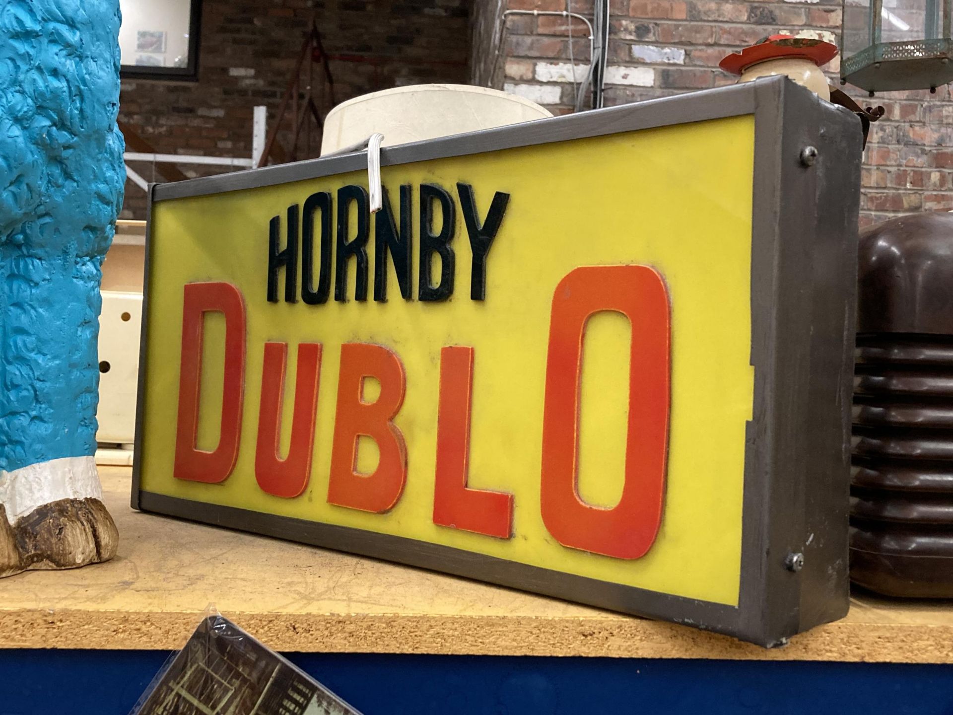 A HORNBY DUBLO ILLUMINATED BOX SIGN