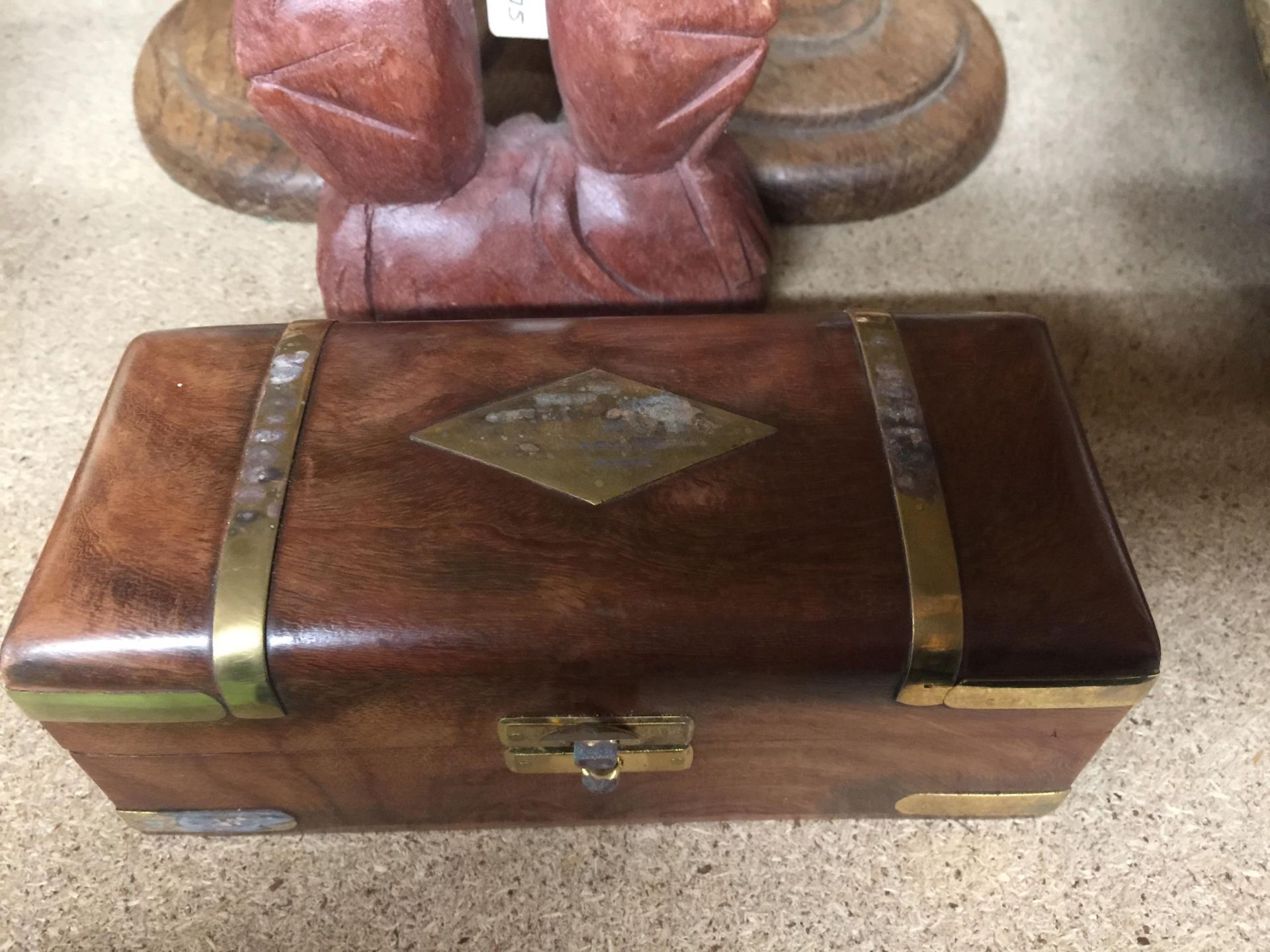 FOUR WOODEN ITEMS - BRASS BOUND BOX, PAIR OF CANDLESTICKS AND MONKEY CARVING - Image 2 of 4