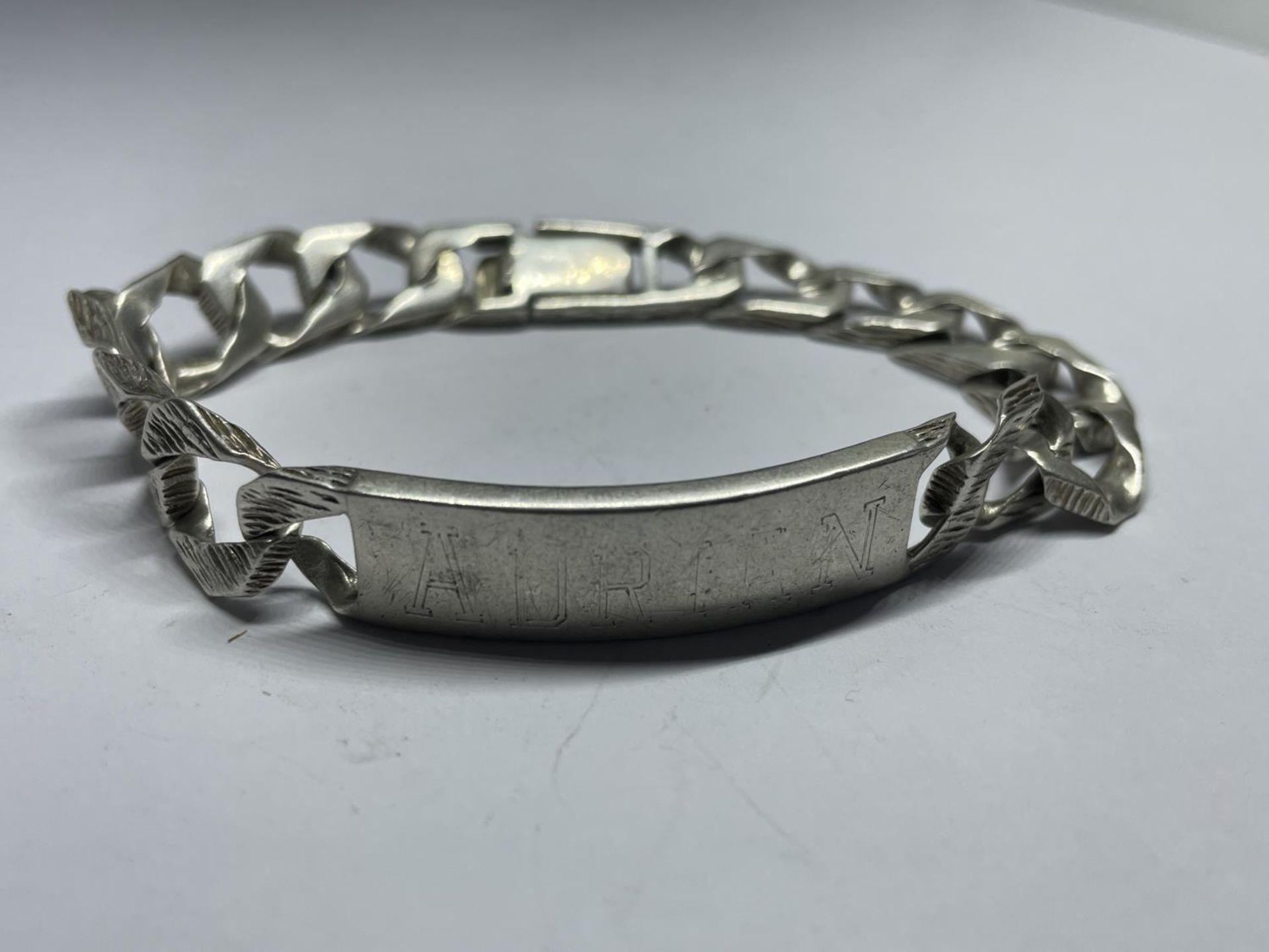 A HALLMARKED LONDON HEAVY SILVER FLAT LINK IDENTITY BRACELET GROSS WEIGHT 44.5 GRAMS