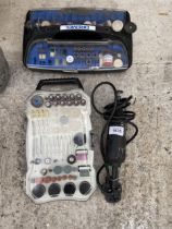 A DREMEL DRILL AND TWO CASED SETS OF DREMEL ACCESSORIES