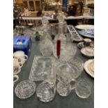 A COLLECTION OF CUT GLASS ITEMS - DECANTERS, BOWLS ETC