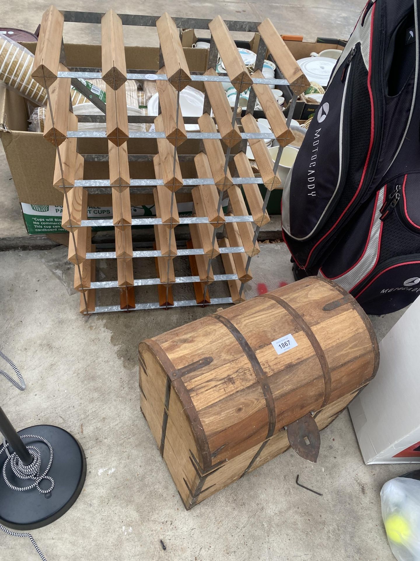 A RUSTIC HARDWOOD SIX BOTTLE WINE CRATE AND A 20 BOTTLE WOODEN AND METAL WINE RACK