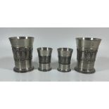 A SET OF FOUR SKS ZINN 95% PEWTER DRINKING GLASSES, HEIGHT OF LARGEST PAIR 9 CM