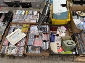 AN ASSORTMENT OF HOUSEHOLD CLEARANCE ITEMS TO INCLUDE CDS AND A MONITOR ETC