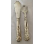 A PAIR OF ELIZABETH II 1963 HALLMARKED SHEFFIELD SILVER FISH KNIFE AND FORK, MAKER GEE & HOLMES,