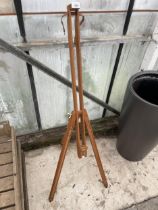 A WOODEN FOLDING TRIPOD ARTISTS EASLE