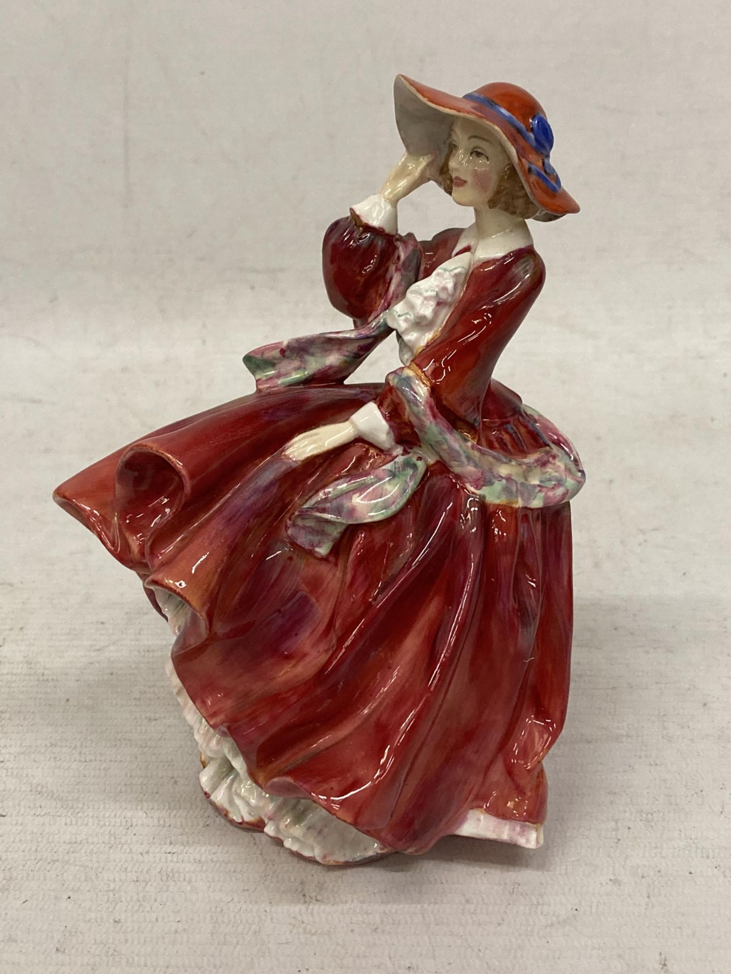 A ROYAL DOULTON 'TOP O' THE HILL' HN1834 LADY FIGURE