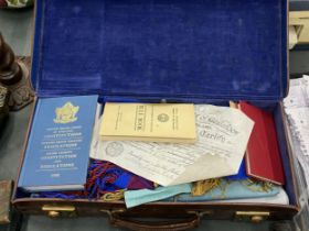 A MASONIC CASE WITH VINTAGE MASONIC APRONS, LITERATURE, ETC