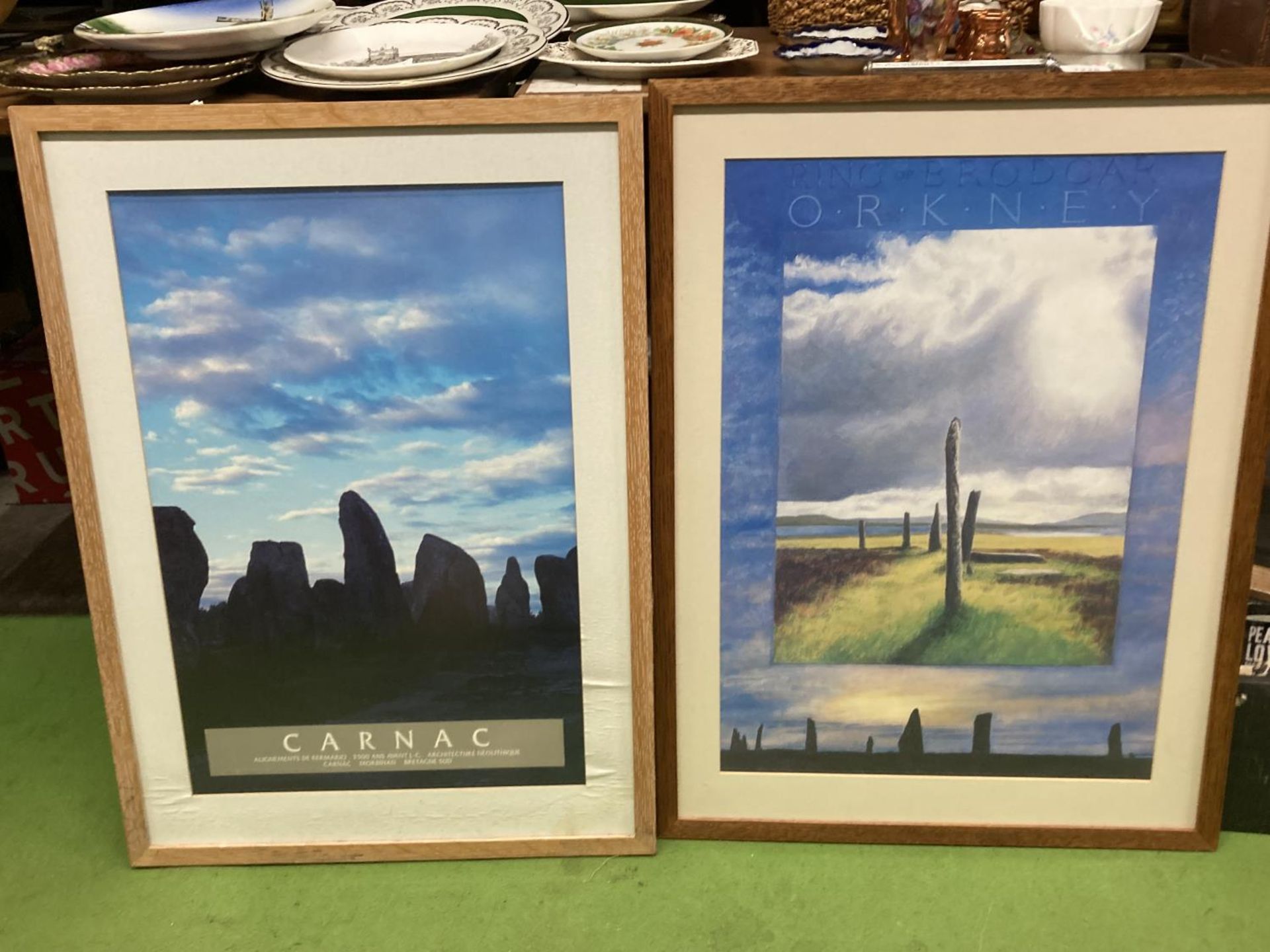 TWO FRAMED POSTERS OF NEOLITHIC RINGS, BRODGAR ON ORKNEY AND CARNAC IN BRITTANY