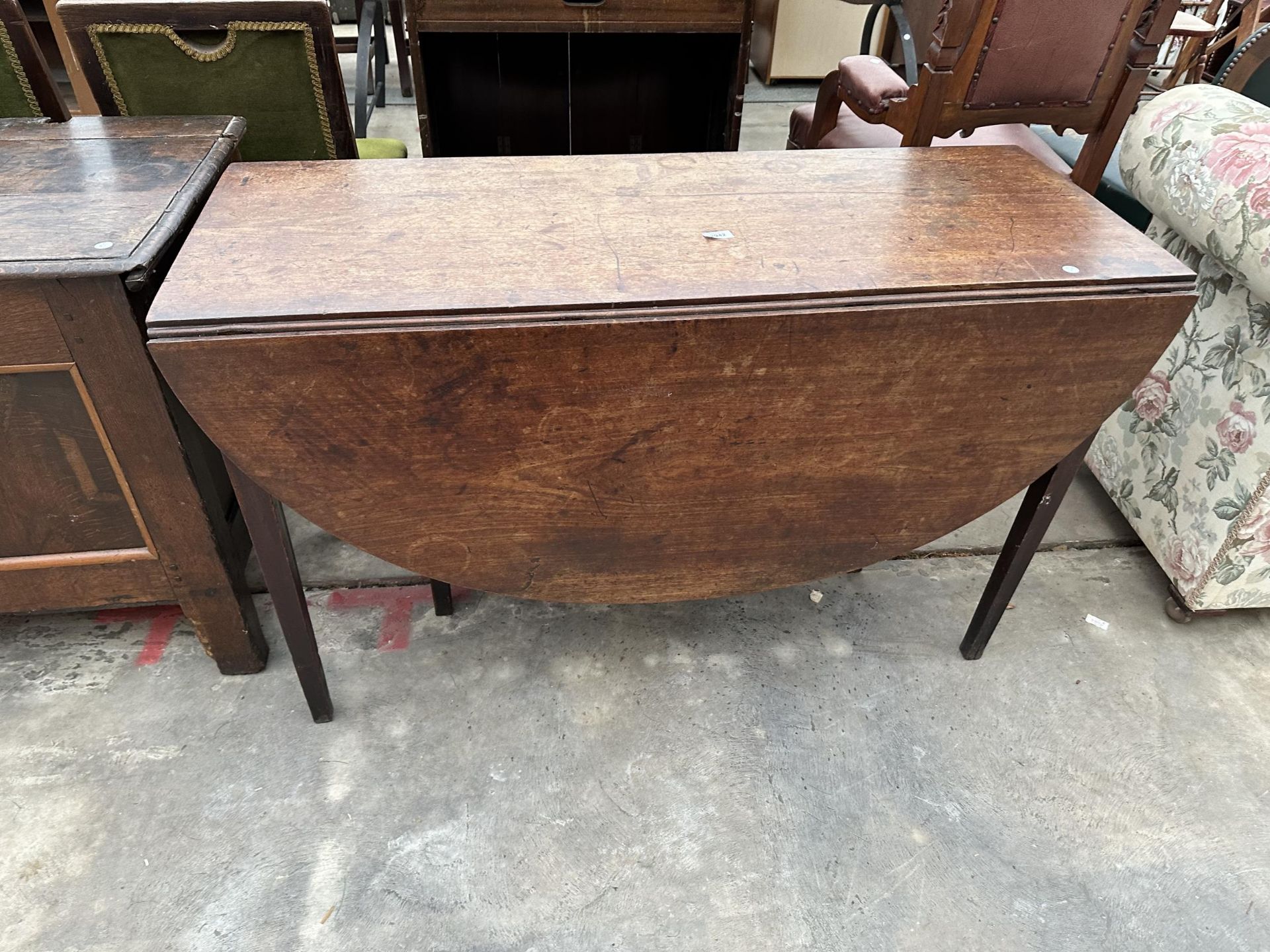 A 19TH CENTURY MAHOGANY DROP-LEAF DINING TABLE, 57 X 49" OPENED