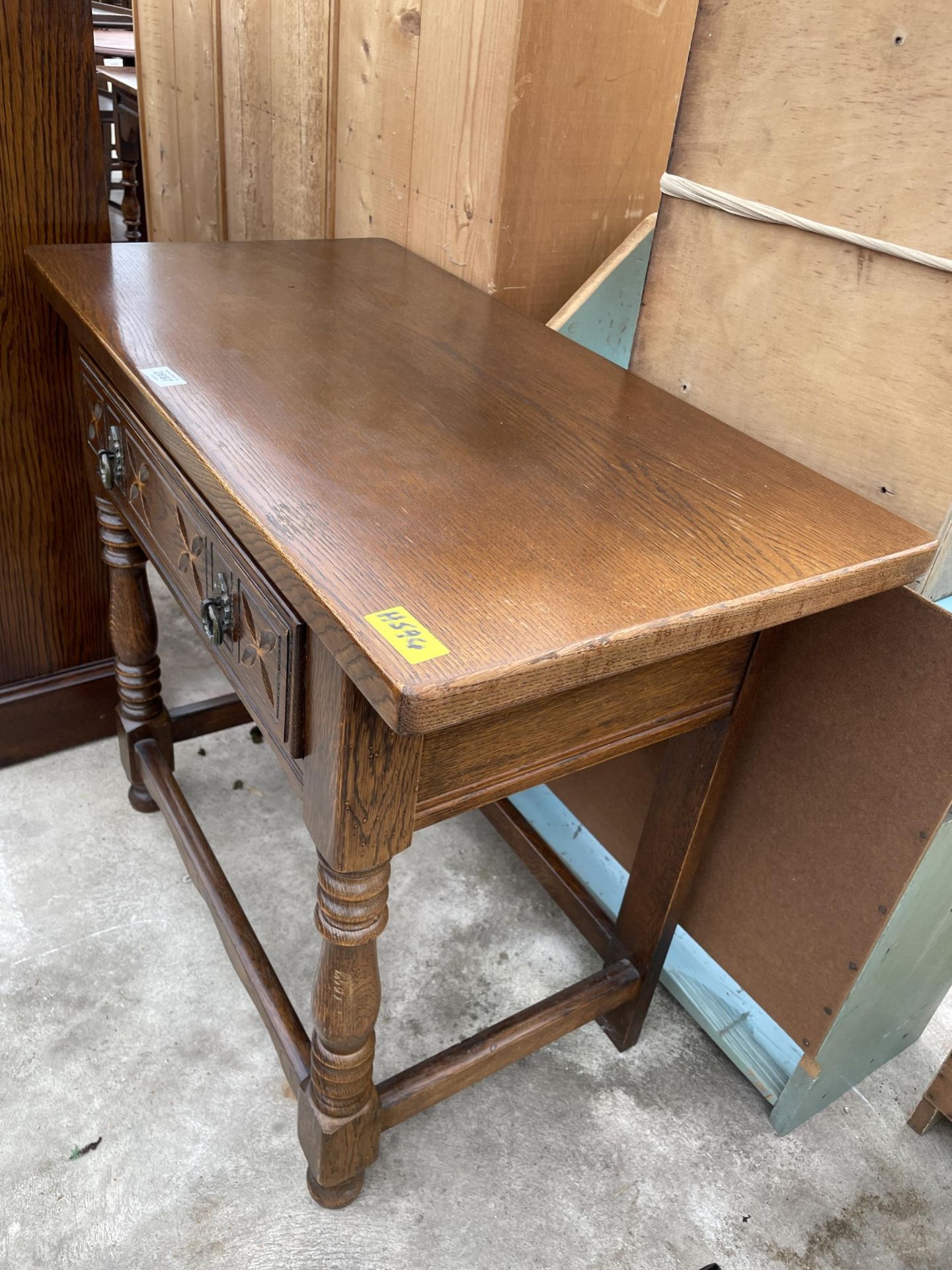 AN OAK JACOBEAN STYLE SIDE-TABLE WITH SINGLE DRAWER ON TURNED FRONT LEGS, 32" WIDE - Image 2 of 3