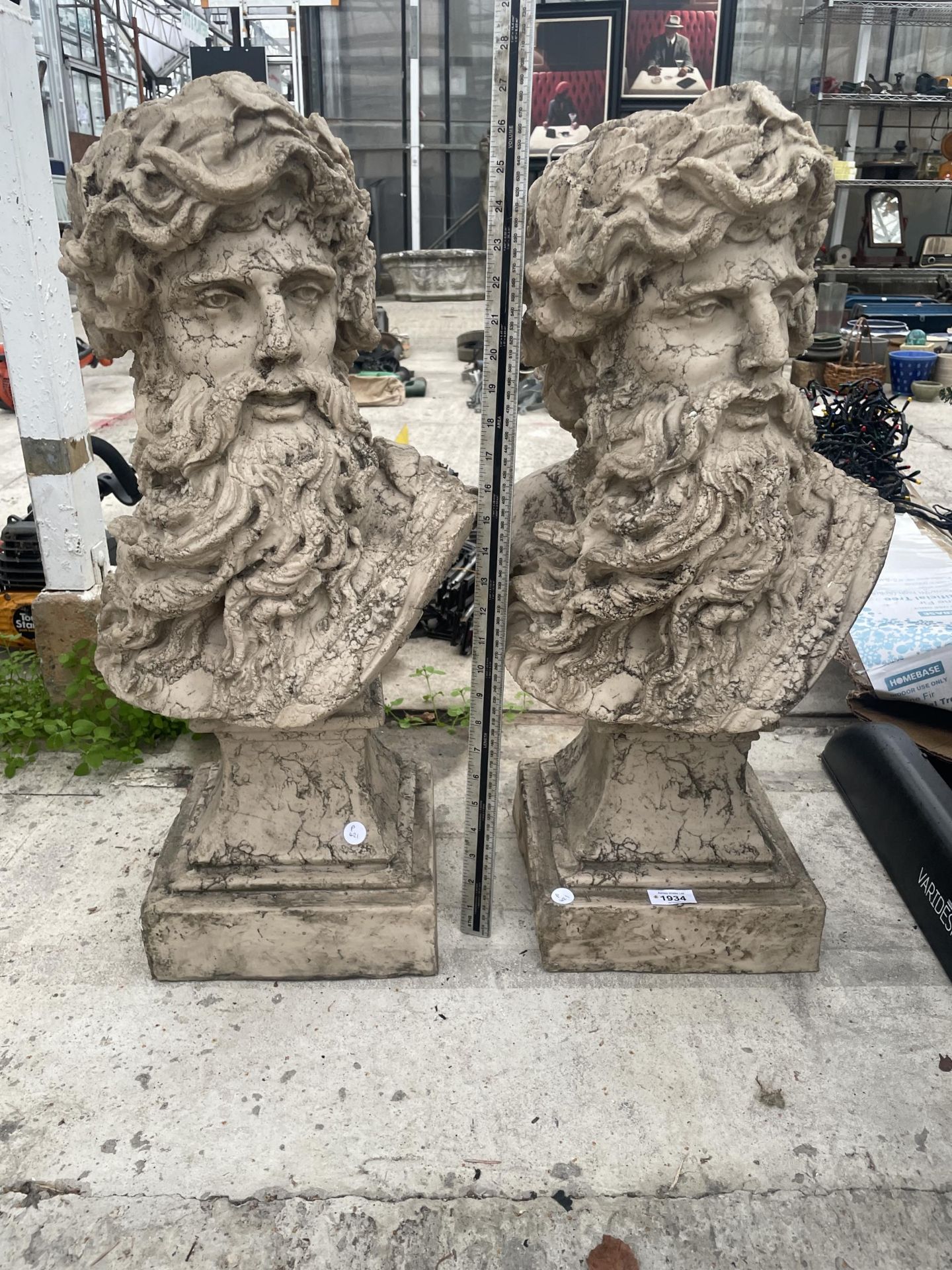 A PAIR OF DECORATIVE RESIN GREEK GOD BUSTS