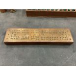 A VINTAGE WOODEN AND BRASS CRIBBAGE GAMES BOARDS