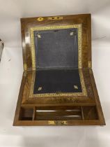 A VINTAGE WALNUT WRITING SLOPE WITH BRASS INLAY AND INLAID STRINGING