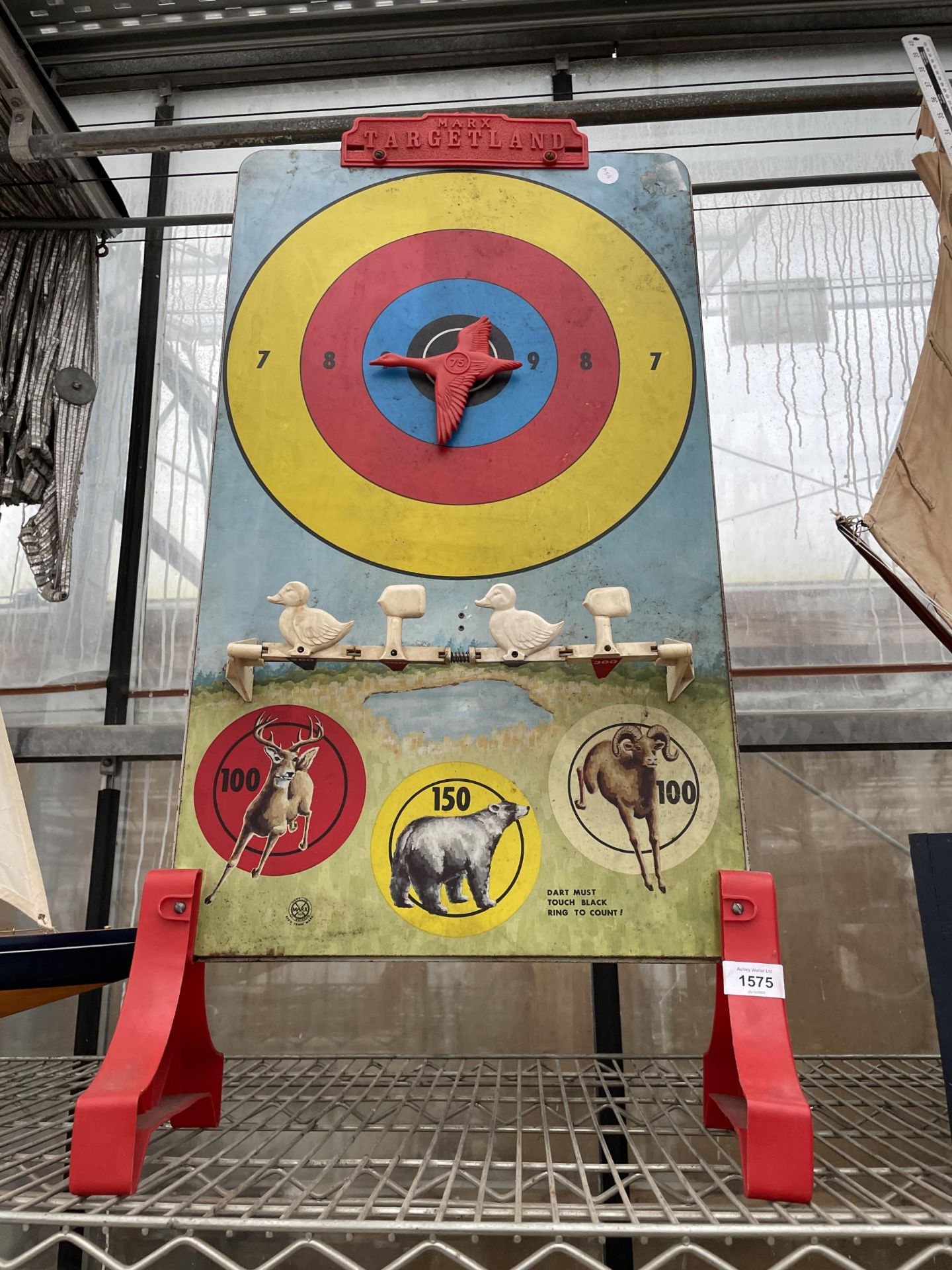 A VINTAGE 'MARX TARGETLAND' DART TARGET