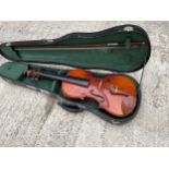 A VIOLIN WITH CARRY CASE