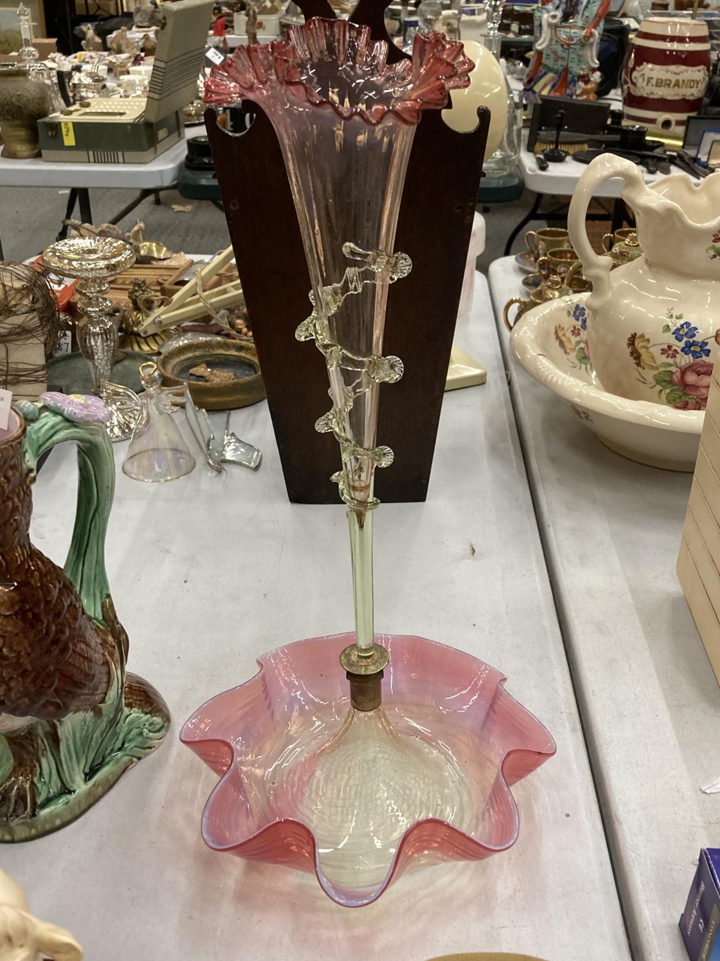 A CRANBERRY GLASS EPERGNE, HEIGHT 44CM