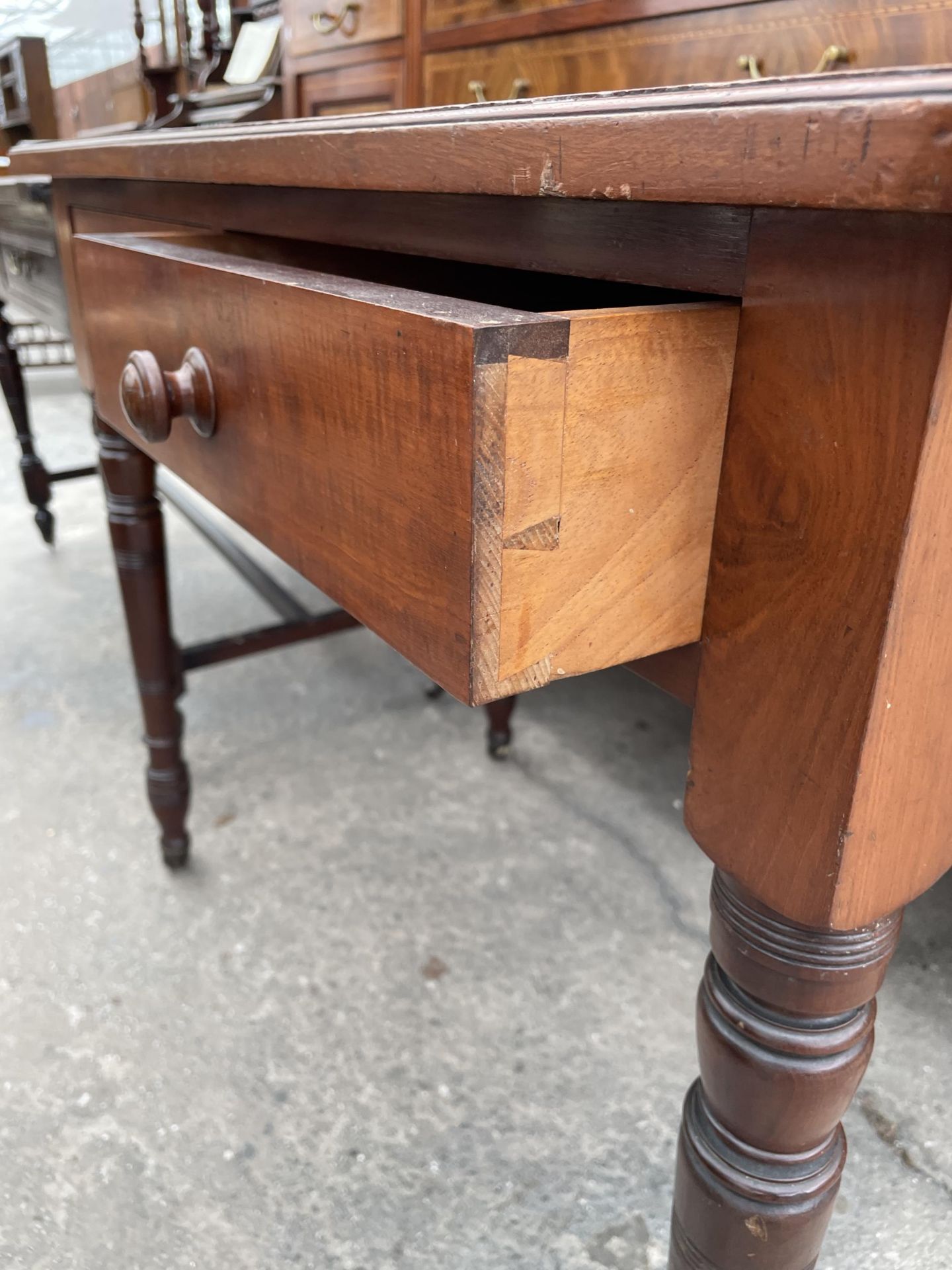 A VICTORIAN MAHOGANY SIDE-TABLE WITH TWO DRAWERS, ON TURNED LEGS, 36" WIDE - Image 3 of 4