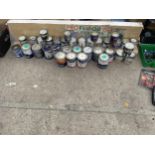 A LARGE ASSORTMENT OF WOOD AND METAL PAINTS