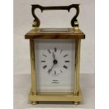 A WATCHES OF SWITZERLAND BRASS CARRIAGE CLOCK