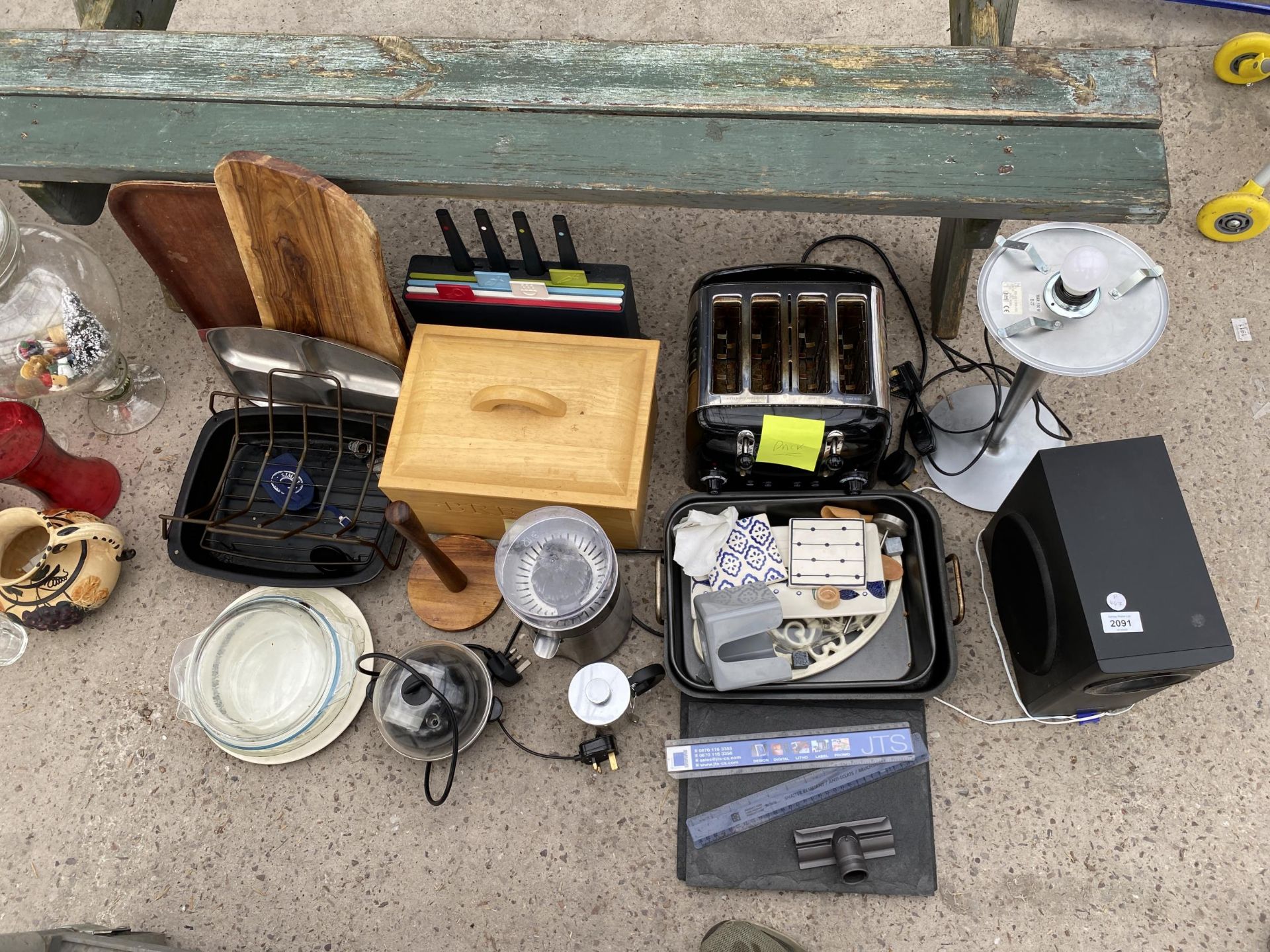 AN ASSORTMENT OF ITEMS TO INCLUDE A TOASTER, TRAYS AND A SPEAKER ETC