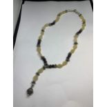 A SILVER AND AGATE STONE NECKLACE