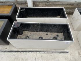 A PAIR OF MODERN LECHUZA LOW FIBRE GLASS TROUGH PLANTERS WITH INSERTS (L:50CM)