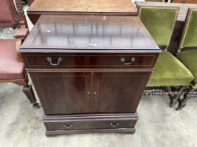 A MAHOGANY AND CROSSBANDED TV CABINET