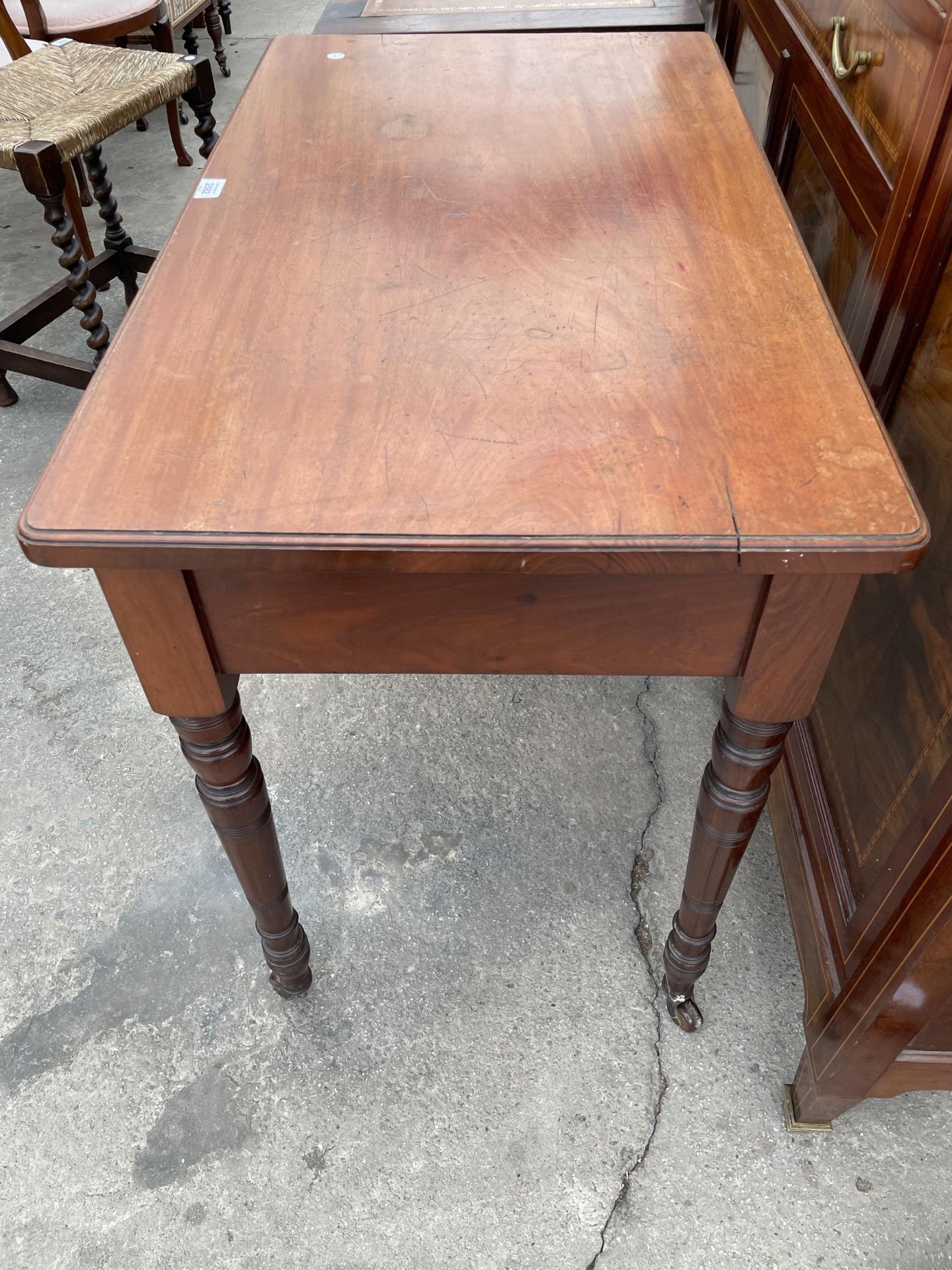 A VICTORIAN MAHOGANY SIDE-TABLE WITH TWO DRAWERS, ON TURNED LEGS, 36" WIDE - Image 4 of 4