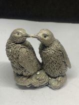 A PAIR OF HALLMARKED STERLING SILVER FILLED PENGUINS