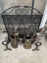 AN ASSORTMENT OF FIRESIDE ITEMS TO INCLUDE A FIRE SCREEN, COMPANION SETS AND A PAIR OF FIRE DOGS ETC