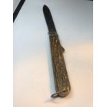 A VINTAGE GREGG SLOANE SQUARE POCKET KNIFE