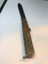 A VINTAGE GREGG SLOANE SQUARE POCKET KNIFE