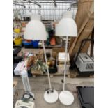 A PAIR OF TALL DECORATIVE STANDARD LAMPS