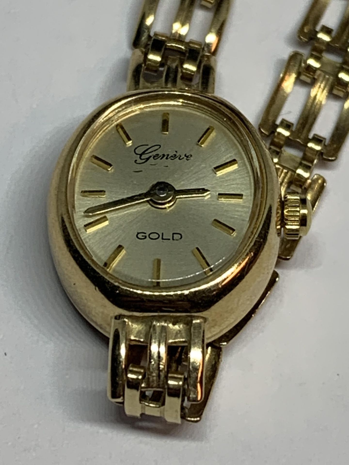 A GENEVE WRIST WATCH WITH 9 CARAT GOLD CASE AND STRAP GROSS WEIGHT 9 GRAMS - Image 2 of 3