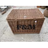 A WICKER FORTMAN AND MASON BASKET