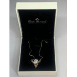 A BOXED SILVER MODA MENTALS CRYSTAL NECKLACE