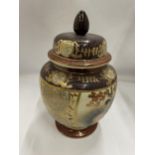 A VINTAGE JAPANESE SATSUMA HAND PAINTED LIDDED TEMPLE JAR AND COVER