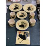 A COLLECTION OF HOLDENBY HEN POTTERY ITEMS, MUGS, PLATES ETC