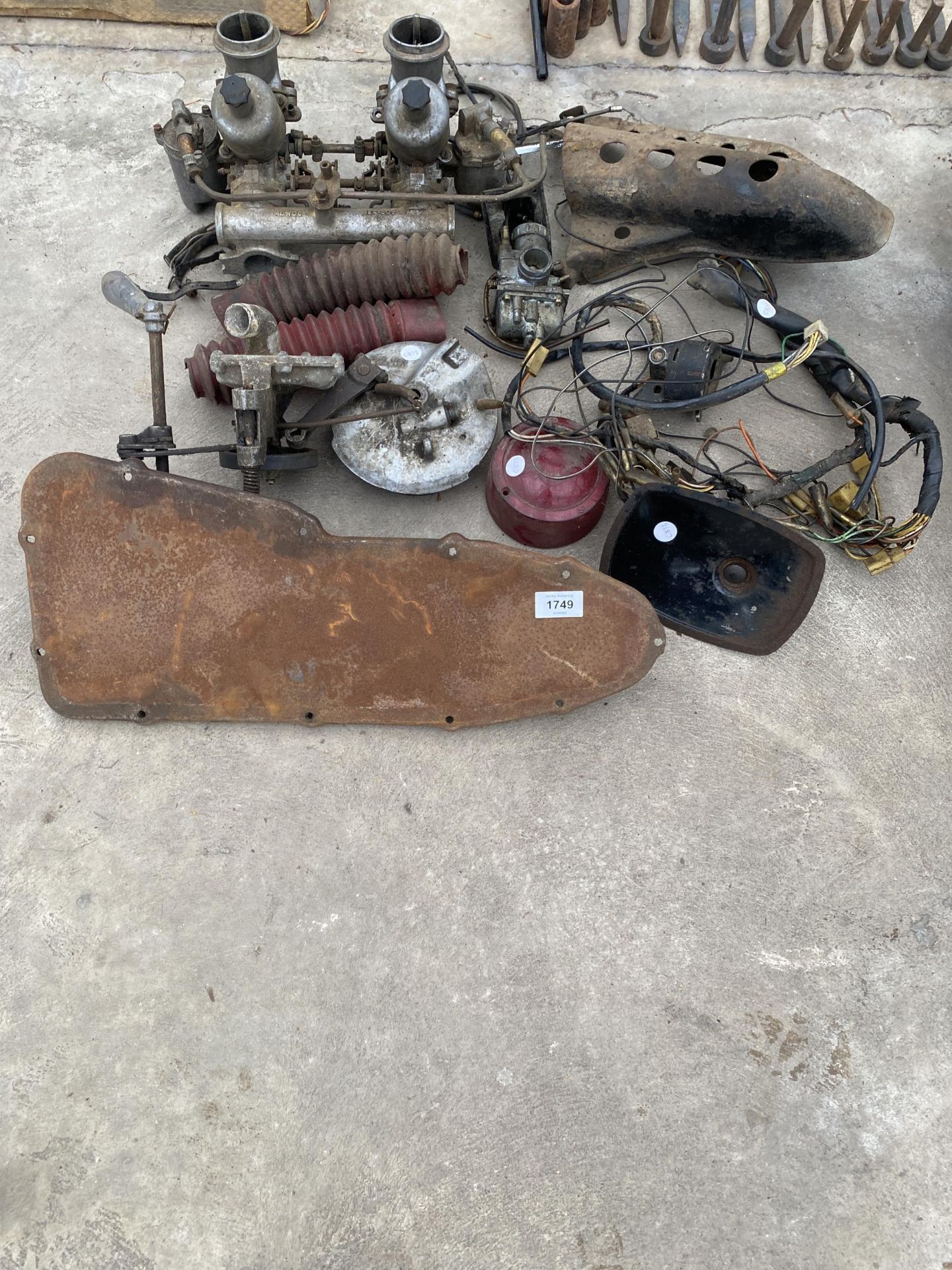 AN ASSORTMENT OF VEHICLE SPARES TO INCLUDE TWIN SU CARBURETORS, GUARDS AND PUMPS ETC