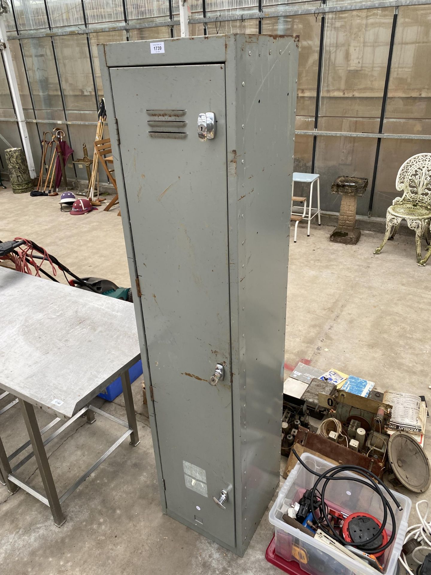 A METAL SINGLE DOOR LOCKER UNIT