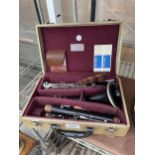 A CASED CONSOLE SUPER CLARINET