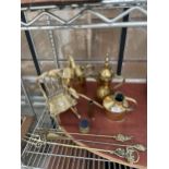 AN ASSORTMENT OF BRASS WARE TO INCLUDE A ROCKING CHAIR, A MIDDLE EASTERN JUG AND A WATERING CAN ETC