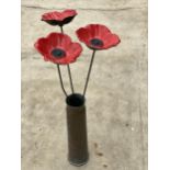 A WORLD WAR TWO ARTILLERY SHELL WITH STEEL REMEMBRANCE POPPIES