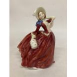 A ROYAL DOULTON 'AUTUMN BREEZES' HN1934 LADY FIGURE