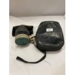 A WW11 HOME GUARD GAS MASK IN THE ORIGINAL CASE