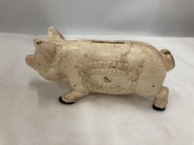 A CAST METAL PIG MONEY BANK