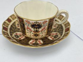 A ROYAL CROWN DERBY IMARI 1128 CUP AND SAUCER